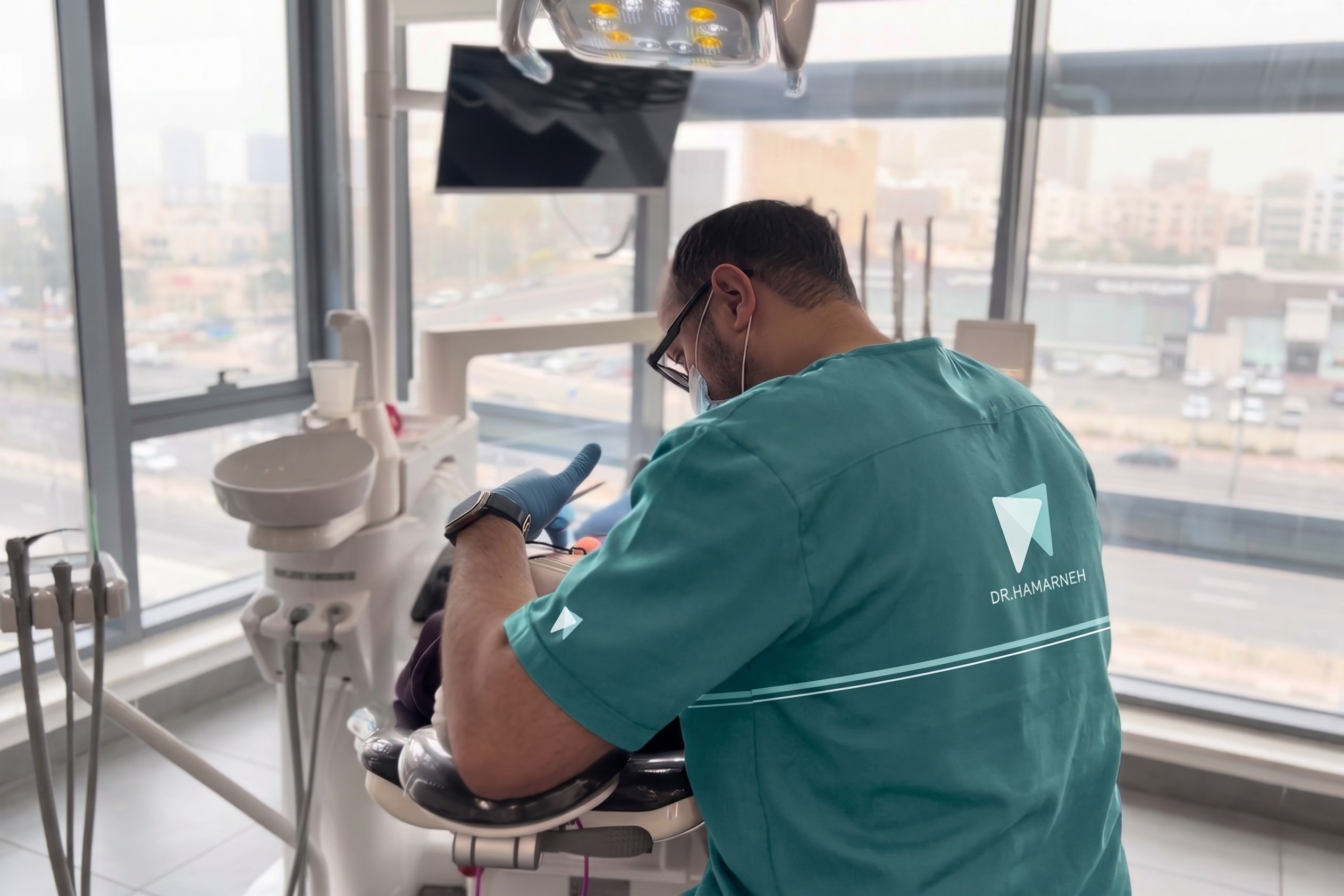 Dr. Khaled Hamarneh planning veneer treatment
