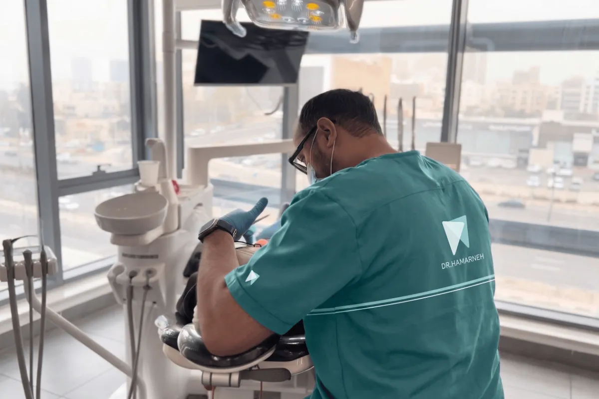 Dentist in Khalda treating a patient in a clean, modern treatment room